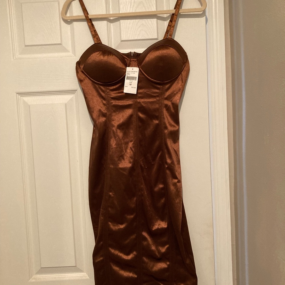 Fashion Nova Stupid in Love Slip Dress.  Bra cups.    Lots of seams.  Shiny.